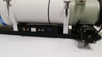 Plug side of shell mounted under scope